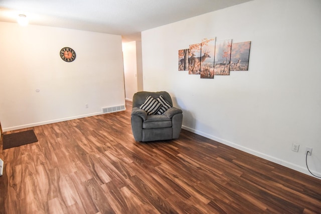 unfurnished room with dark hardwood / wood-style floors