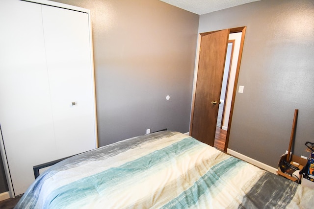 bedroom featuring hardwood / wood-style floors