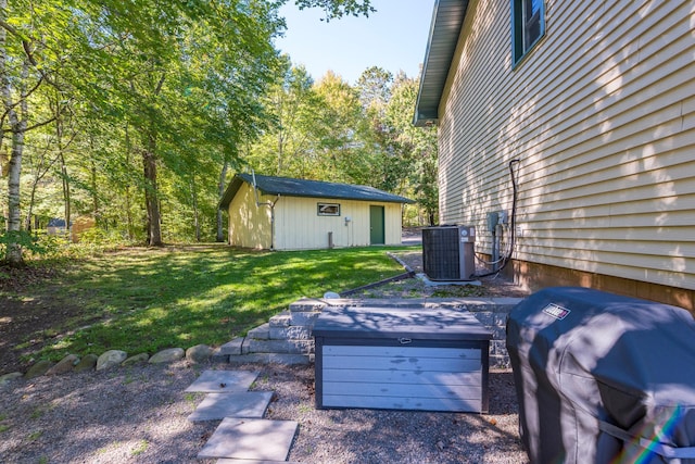 27734 Ridgewood Dr, Merrifield, MN 56465 - view of patio featuring grilling area, an outdoor structure, and central AC