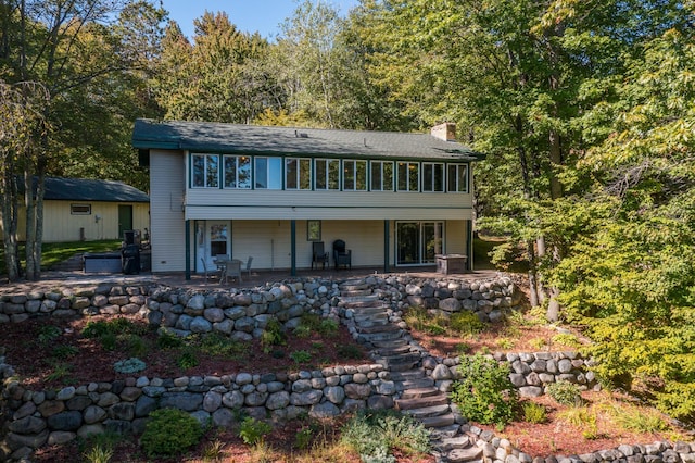 back of property with a patio area