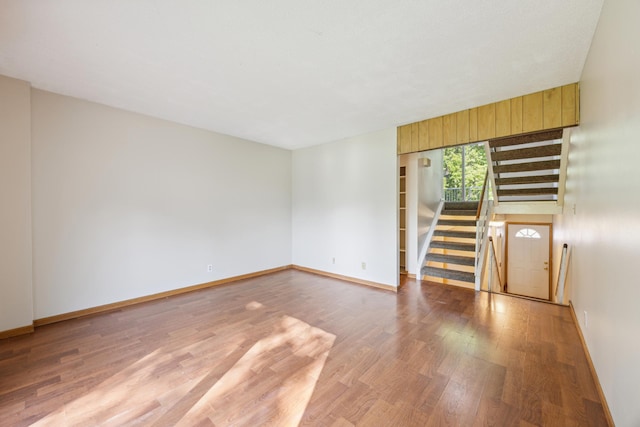 spare room with light hardwood / wood-style flooring