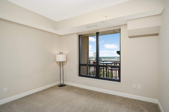 unfurnished room featuring carpet floors