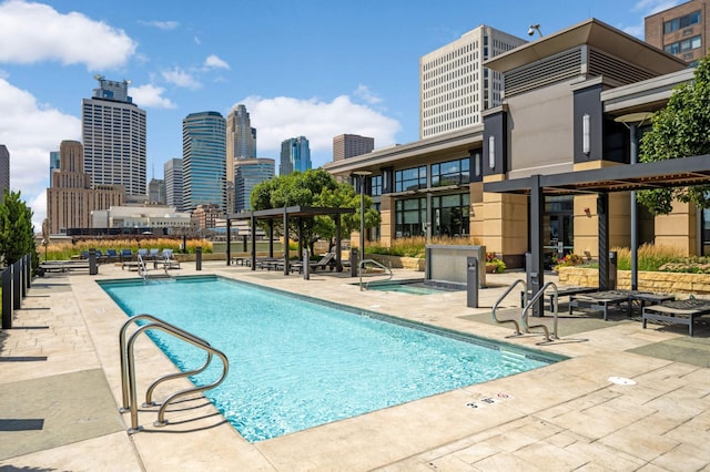 view of swimming pool featuring a patio