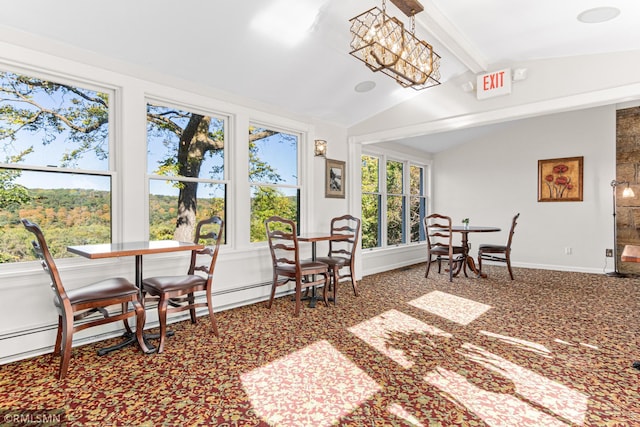 sunroom / solarium with baseboard heating and lofted ceiling with beams