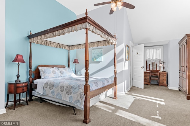 carpeted bedroom featuring high vaulted ceiling and ceiling fan