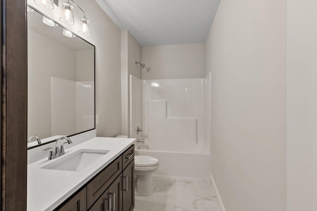 full bathroom with a textured ceiling, washtub / shower combination, vanity, and toilet