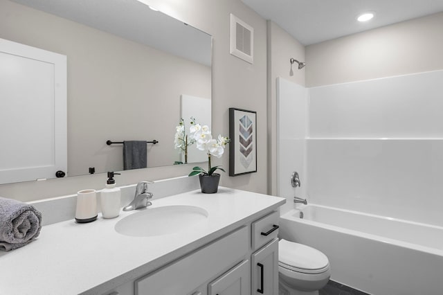 full bathroom featuring vanity, shower / bathtub combination, and toilet