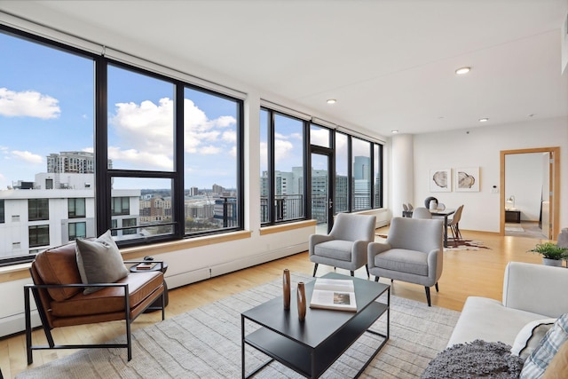 living room with light hardwood / wood-style flooring