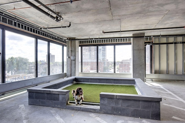 unfurnished sunroom with a wealth of natural light