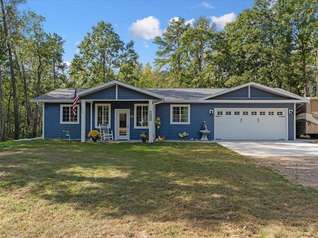 single story home with a front yard and a garage