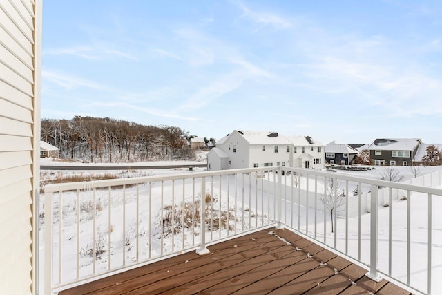 view of snow covered deck