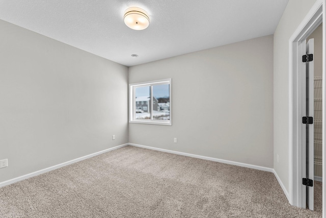 empty room featuring carpet