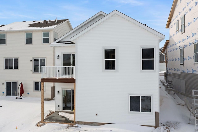 view of snow covered house