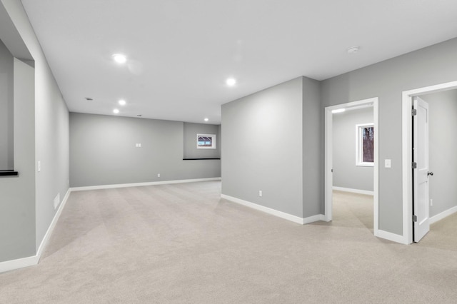 basement with light colored carpet