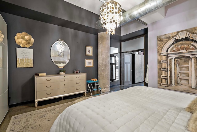 bedroom featuring a notable chandelier