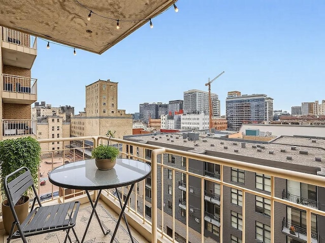 balcony featuring a view of city