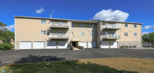 view of building exterior featuring a garage