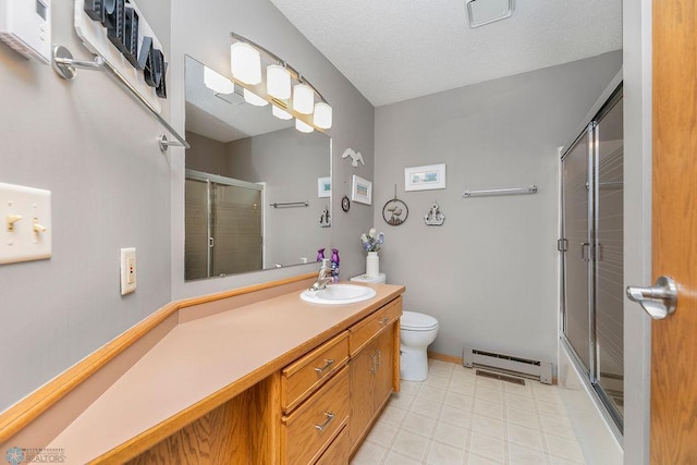 bathroom featuring vanity, walk in shower, a textured ceiling, a baseboard radiator, and toilet