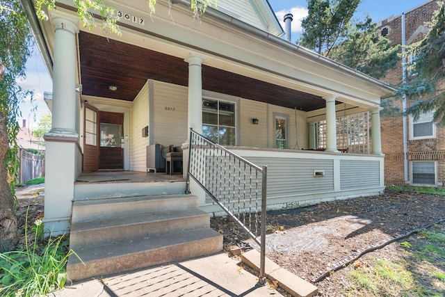 doorway to property with a porch