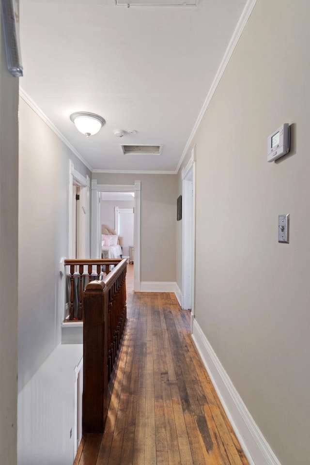 3017 James Ave S, Minneapolis, MN 55408 - hallway with hardwood / wood-style flooring, crown molding, and attic access