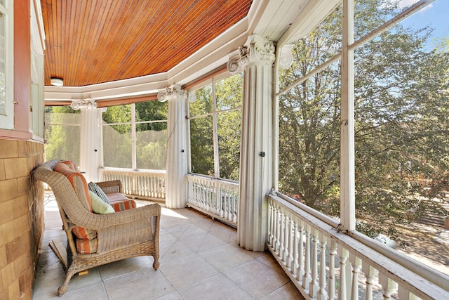 sunroom with wood ceiling