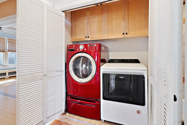 laundry area with cabinets and washer and dryer