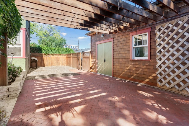 view of patio featuring a pergola