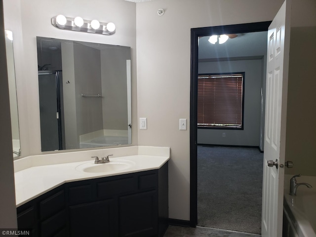 bathroom with vanity and plus walk in shower