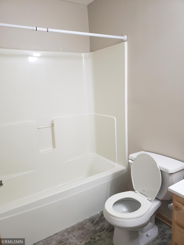 full bathroom featuring tub / shower combination, vanity, and toilet