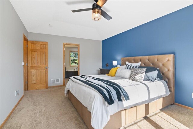 bedroom featuring ceiling fan and light carpet