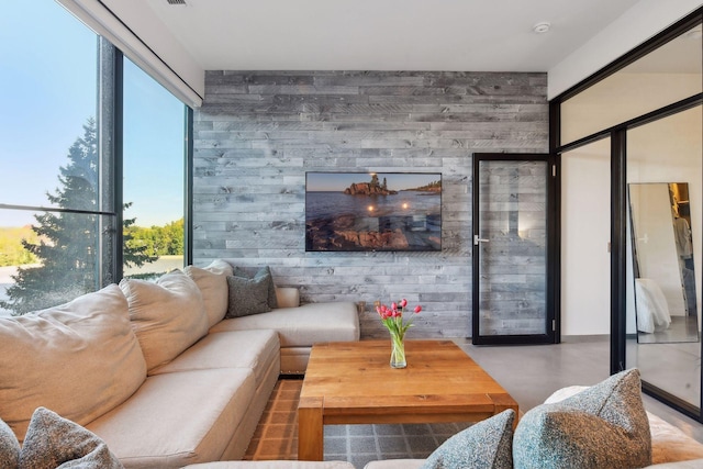 living room featuring concrete flooring