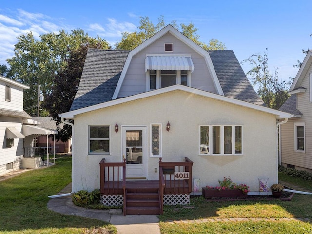 bungalow with a front lawn