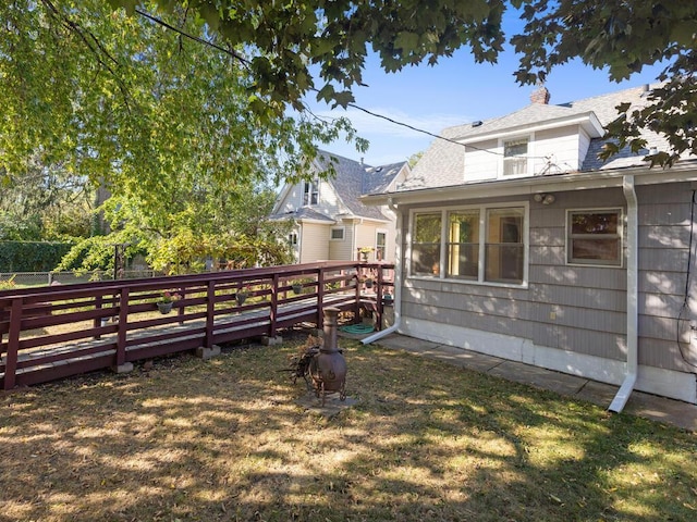 view of yard featuring a wooden deck