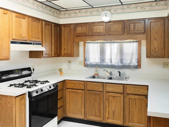 kitchen with range with gas cooktop and sink