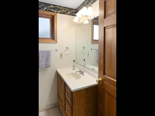 bathroom with vanity and tile patterned flooring