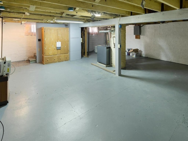 basement featuring washer / dryer and electric panel