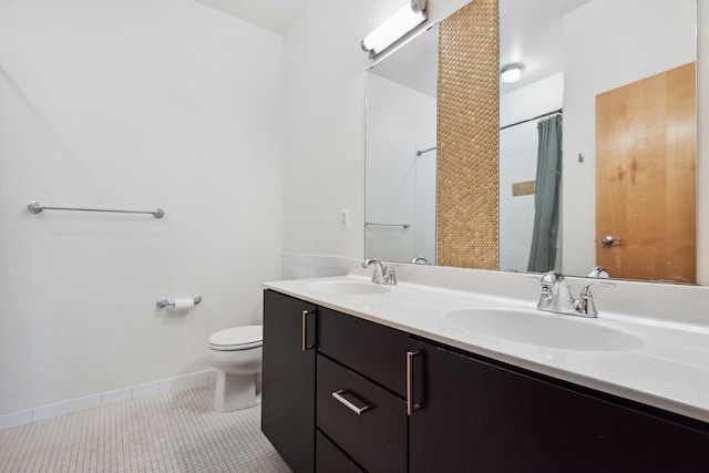 bathroom with vanity, tile patterned flooring, toilet, and a shower with shower curtain