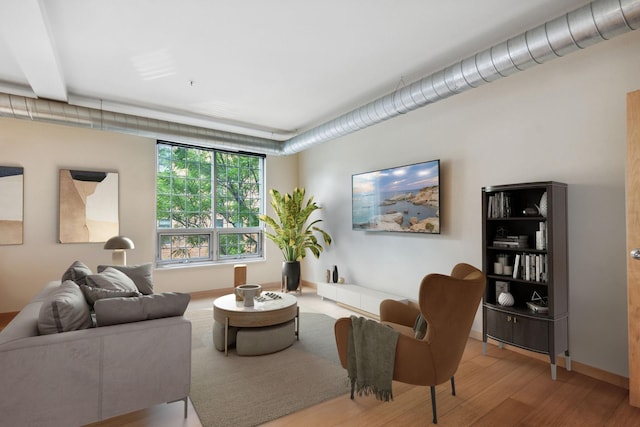 living room with light hardwood / wood-style floors