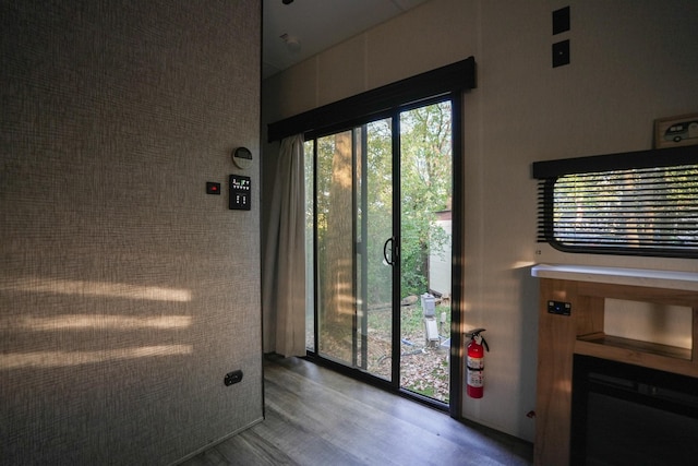 doorway to outside with hardwood / wood-style floors