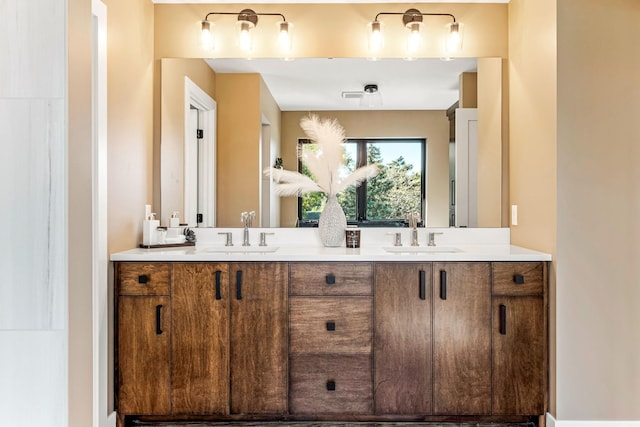 full bathroom featuring a sink and double vanity