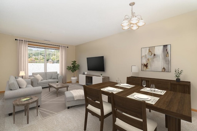 carpeted dining area featuring an inviting chandelier