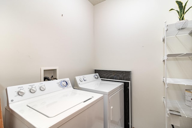 laundry area featuring washing machine and dryer