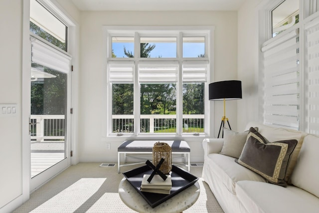 interior space featuring visible vents and a healthy amount of sunlight