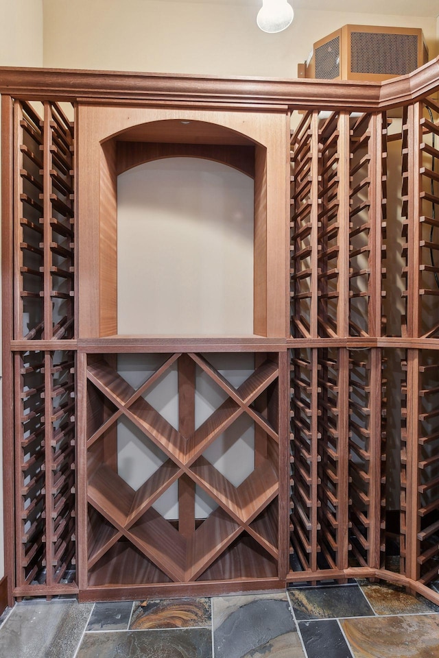wine cellar with stone tile flooring