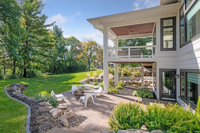 view of patio featuring an outdoor fire pit