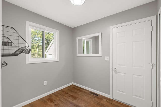 unfurnished room featuring hardwood / wood-style floors