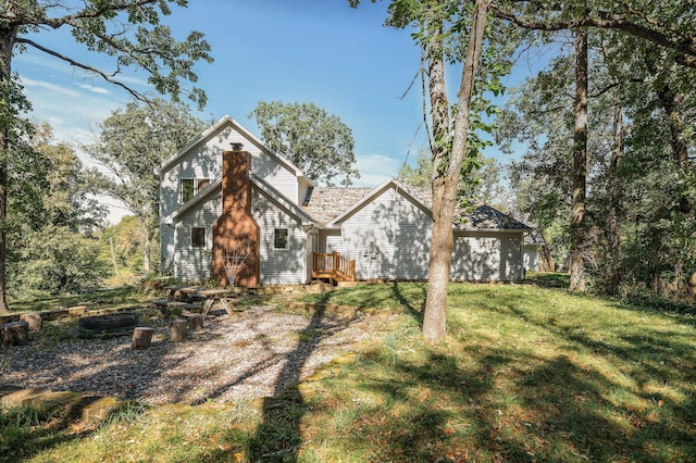 exterior space featuring a front lawn