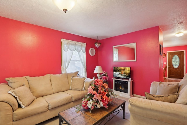 living room with a textured ceiling