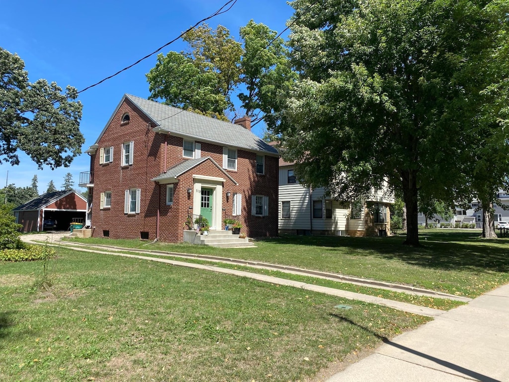 colonial house with a front lawn