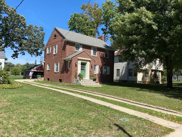 view of front of property featuring a front lawn